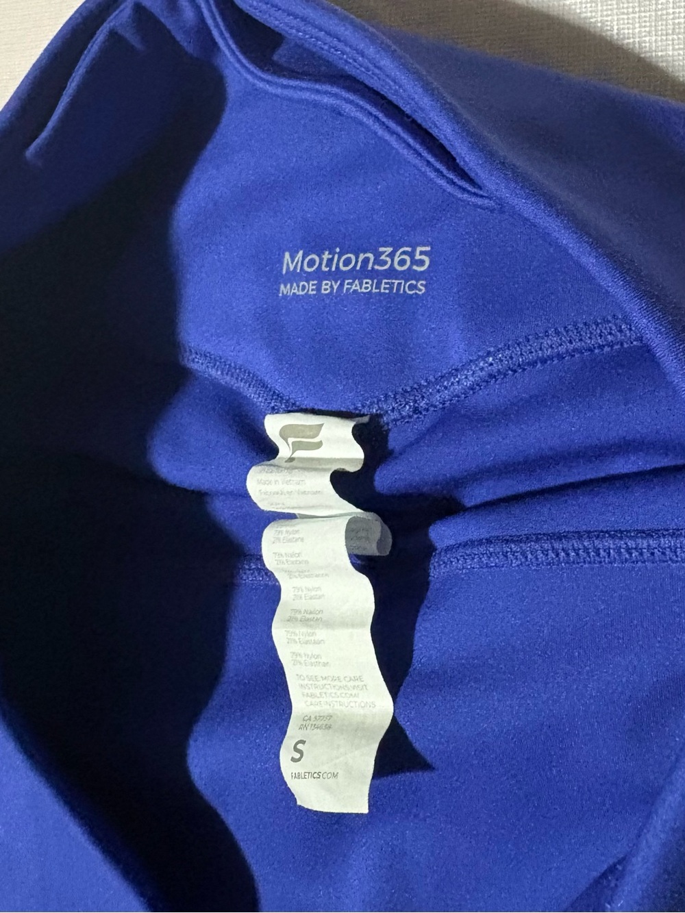 Fabletics Royal Blue Kids' High-Waist Leggings with Side Pockets - Picture 3 of 3